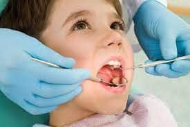 SMART Blog 3 Child receiving a dental examination