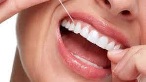 SMART Blog 8 Dental floss cleaning between teeth