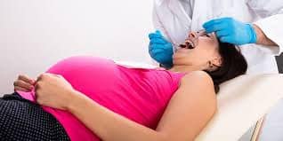 SMART Blog 6 Pregnant patient receiving an oral examination