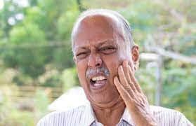 SMART Blog 2 Older man holding his cheek